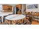 Bright kitchen with a marble dining table and stainless steel appliances at 2015 Towne Lake W Hls, Woodstock, GA 30189