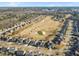 Stunning aerial view of the community surrounding a golf course, highlighting the lush greenery and serene atmosphere at 3313 Alhambra Cir, Hampton, GA 30228