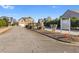 Well-maintained community entrance with lush landscaping and clear signage, offering a welcoming first impression at 3313 Alhambra Cir, Hampton, GA 30228