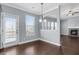 Dining area with lots of windows, deck access, and easy access to the kitchen and living room at 3313 Alhambra Cir, Hampton, GA 30228