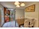 Comfortable dining area features a table, chairs, and artwork at 1638 River Trce, Auburn, GA 30011