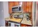 Contemporary kitchen design featuring stainless steel appliances and granite countertops at 1638 River Trce, Auburn, GA 30011