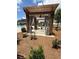 Poolside gazebo with seating and curtains, located at the community pool at 2002 Freestone Way, Marietta, GA 30064