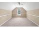 Bonus room features a large window, fresh paint, and neutral carpet at 2605 Woodland Hills Dr, Cumming, GA 30040