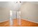Spacious main bedroom with vaulted ceiling and hardwood floors at 2605 Woodland Hills Dr, Cumming, GA 30040