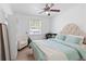 Inviting bedroom featuring a bed, a soft chair, and ample natural light at 3147 Buford Ne Hwy # 8, Brookhaven, GA 30329