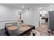 Bright dining area with a modern dining table and convenient access to kitchen and living room at 3147 Buford Ne Hwy # 8, Brookhaven, GA 30329