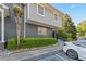 Beautifully maintained townhome with manicured hedges and assigned parking space in a desirable community at 3147 Buford Ne Hwy # 8, Brookhaven, GA 30329