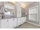 Bright bathroom with double sinks, granite countertops, white cabinetry, and large mirrors at 4298 Kingston Gate Cv, Chamblee, GA 30341