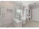 Beautiful bathroom featuring a soaking tub and walk-in shower with marble surround at 4298 Kingston Gate Cv, Chamblee, GA 30341