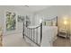 Bedroom with metal frame bed, neutral colors, and natural light at 4298 Kingston Gate Cv, Chamblee, GA 30341