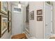 Inviting entryway featuring hardwood floors and elegant artwork on the walls at 4298 Kingston Gate Cv, Chamblee, GA 30341