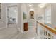 Upstairs hallway that leads to bedrooms and includes display nook for decor at 4298 Kingston Gate Cv, Chamblee, GA 30341
