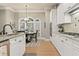 Bright kitchen featuring granite countertops, stainless steel appliances, and a cozy breakfast nook at 4298 Kingston Gate Cv, Chamblee, GA 30341