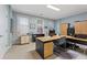 Bright office space with natural light from two windows, desk, and ample storage space at 4298 Kingston Gate Cv, Chamblee, GA 30341
