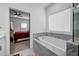 Beautiful bathroom showcasing a luxurious soaking tub and modern fixtures at 4565 Sims Park Ovlk, Suwanee, GA 30024