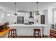 Bright kitchen featuring modern appliances, large island, and hardwood floors at 4565 Sims Park Ovlk, Suwanee, GA 30024