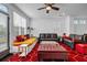 Cozy living room with bright furnishings, large windows, and a comfortable seating arrangement at 4565 Sims Park Ovlk, Suwanee, GA 30024
