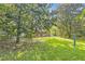 Large mature trees in the spacious backyard at 7577 Haley Dr, Jonesboro, GA 30236