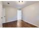Bedroom with hardwood floors, neutral walls, and natural light at 7577 Haley Dr, Jonesboro, GA 30236