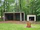 Property features open storage and a detached shed in a wooded setting at 350 Lakeview Dr, Brooks, GA 30205
