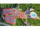 Aerial view of community amenities featuring tennis courts, basketball court, and a sparkling swimming pool at 4305 Chesapeake Trce, Acworth, GA 30101