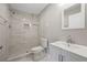 Modern bathroom featuring a tiled shower, toilet, and vanity with a sink, providing a clean and functional space at 4305 Chesapeake Trce, Acworth, GA 30101