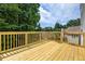 New wooden deck, overlooking trees, perfect for outdoor entertaining and relaxation at 4305 Chesapeake Trce, Acworth, GA 30101