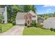 Charming two-story home with brick and siding, featuring a well-manicured lawn and inviting curb appeal at 4305 Chesapeake Trce, Acworth, GA 30101
