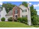 Charming two-story home featuring a well-manicured lawn and inviting front entrance at 4305 Chesapeake Trce, Acworth, GA 30101