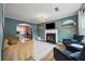 Stylish living room featuring a fireplace, modern decor, and ample seating at 4305 Chesapeake Trce, Acworth, GA 30101