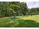 Outdoor workout area with green equipment and grassy area, great for staying active at 4305 Chesapeake Trce, Acworth, GA 30101