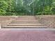 Retaining wall with steps leading to the yard at 45 Mountain Crest Dr, Oxford, GA 30054