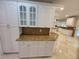 Kitchen with granite countertops, white cabinets, and tile backsplash at 45 Mountain Crest Dr, Oxford, GA 30054