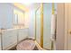 Bright bathroom with modern vanity and ornate gold framed shower at 5293 Sandy Shoals Ln, Stone Mountain, GA 30087