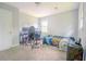 Bedroom with carpet at 5293 Sandy Shoals Ln, Stone Mountain, GA 30087