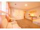 Cozy bonus room with plush seating and bright natural light at 5293 Sandy Shoals Ln, Stone Mountain, GA 30087