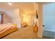 Bedroom featuring plush carpeting, tv, and decorative fireplace at 5293 Sandy Shoals Ln, Stone Mountain, GA 30087