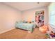 Bright bedroom with carpet and ample closet space at 5293 Sandy Shoals Ln, Stone Mountain, GA 30087