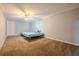 Neutral toned bedroom with carpet at 5293 Sandy Shoals Ln, Stone Mountain, GA 30087