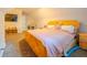 Spacious bedroom featuring plush carpeting, large bed, and tv at 5293 Sandy Shoals Ln, Stone Mountain, GA 30087