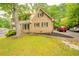 Multi-car parking pad at the side of a well maintained home at 5293 Sandy Shoals Ln, Stone Mountain, GA 30087