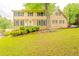 Charming home with a well maintained lawn and landscaping at 5293 Sandy Shoals Ln, Stone Mountain, GA 30087