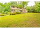 Charming home with a well maintained lawn and landscaping at 5293 Sandy Shoals Ln, Stone Mountain, GA 30087