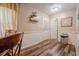Functional laundry area with modern appliances, storage shelves, and convenient access to outdoor area at 5293 Sandy Shoals Ln, Stone Mountain, GA 30087