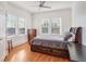 Bright bedroom with hardwood floors, large windows, and a ceiling fan at 690 Piedmont Ne Ave # 17, Atlanta, GA 30308