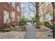 Brick courtyard featuring gravel accents, seating, and manicured plants at 690 Piedmont Ne Ave # 17, Atlanta, GA 30308