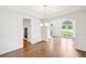 Dining room featuring hardwood flooring, wainscotting, and a chandelier at 765 Brooks Cir, Stone Mountain, GA 30087