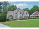 Elegant brick home with well-maintained lawn and landscaping, highlighting curb appeal at 765 Brooks Cir, Stone Mountain, GA 30087