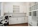 Well-organized home office with custom built-ins and granite countertops at 114 Village Green Ave, Woodstock, GA 30189